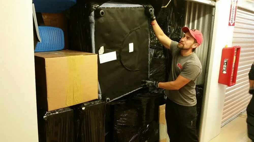ETG mover loading furniture into a storage unit